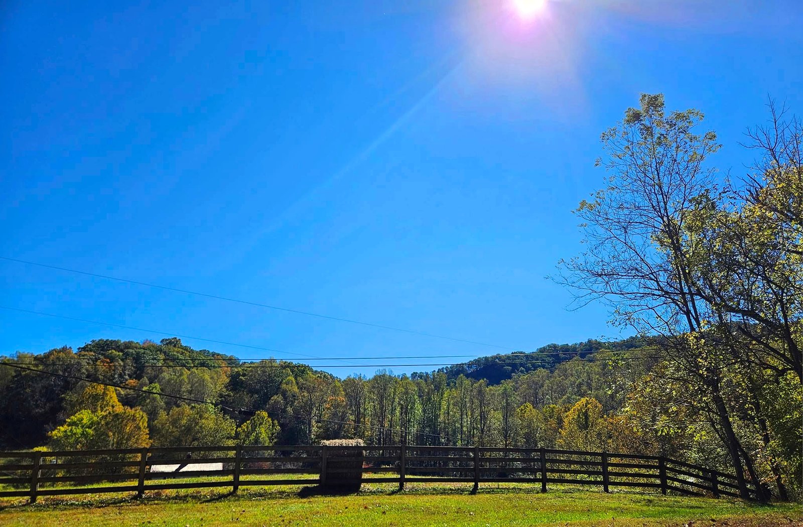 Farm with Hay bail and fence