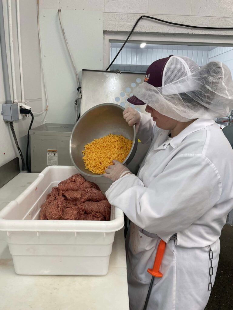 Laci Fleenor making Bratwurst