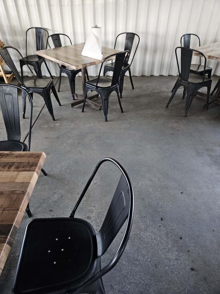 Seating in the dining room of Bristol Gardens & Grill