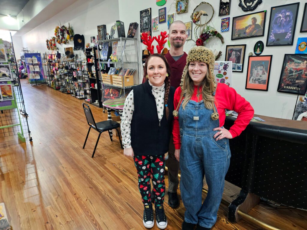 co-owner Alesia Wood, her husband Brad, and their Tarot Manager Sleighter Davis