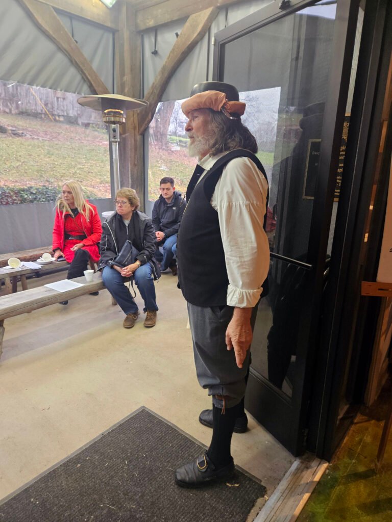 Michael Henningsen listening to a lecture about apples and their history.