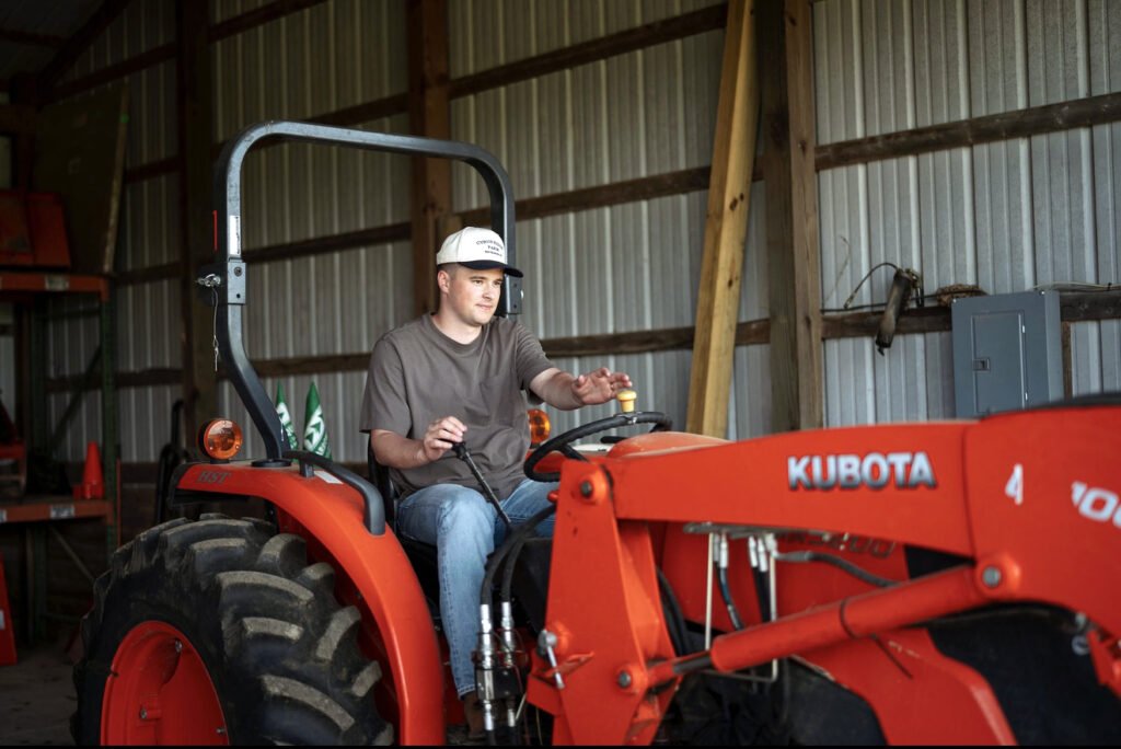 Aldus drives the tractor