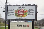 Big Red Apple Shed Grand Opening Sign