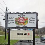 Big Red Apple Shed Grand Opening Sign