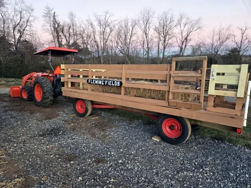 469748219_122119806056617804_2056250869045567235_n - Appalachian Highlands Farmers Magazine Hay Wagon used to transport guests to the fields and trail