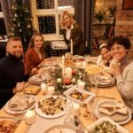 Family at the table with dinner