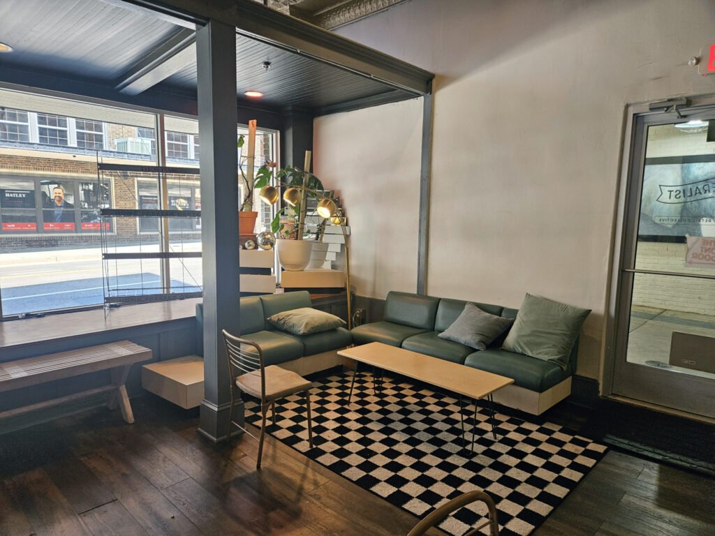 A lounge where people can talk, read, and watch the passers by.