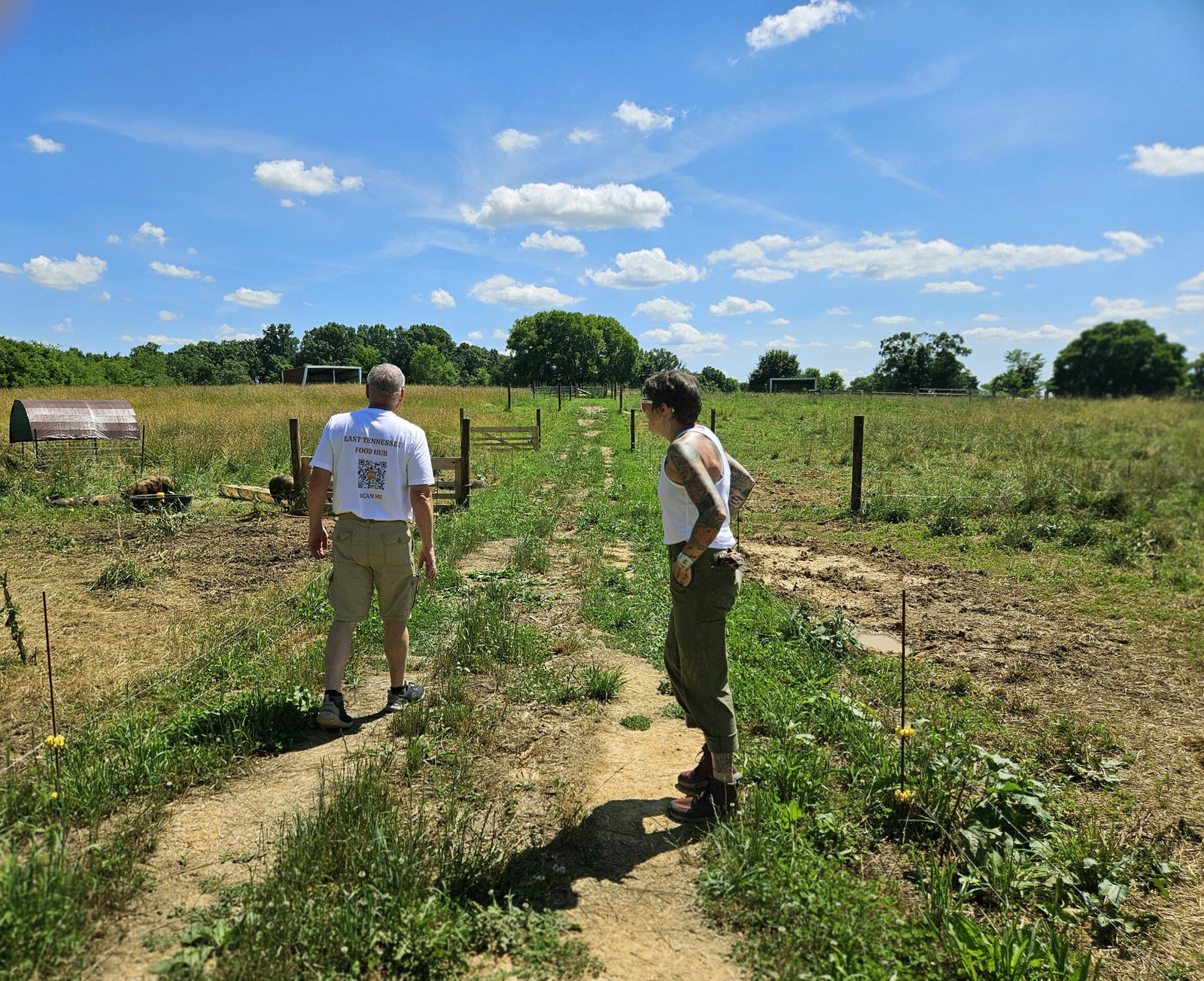Woody Boyd and Abby Terhune tour the farm.