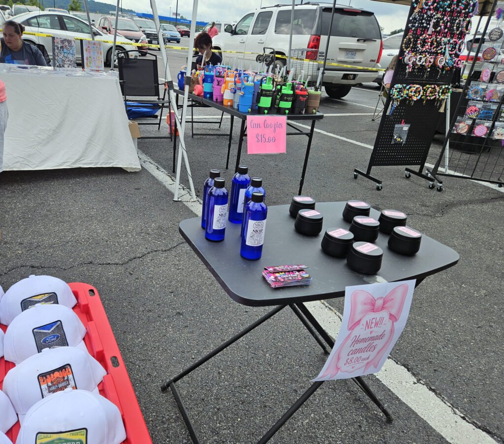 Various products being sold at a booth at the Farmers Market
