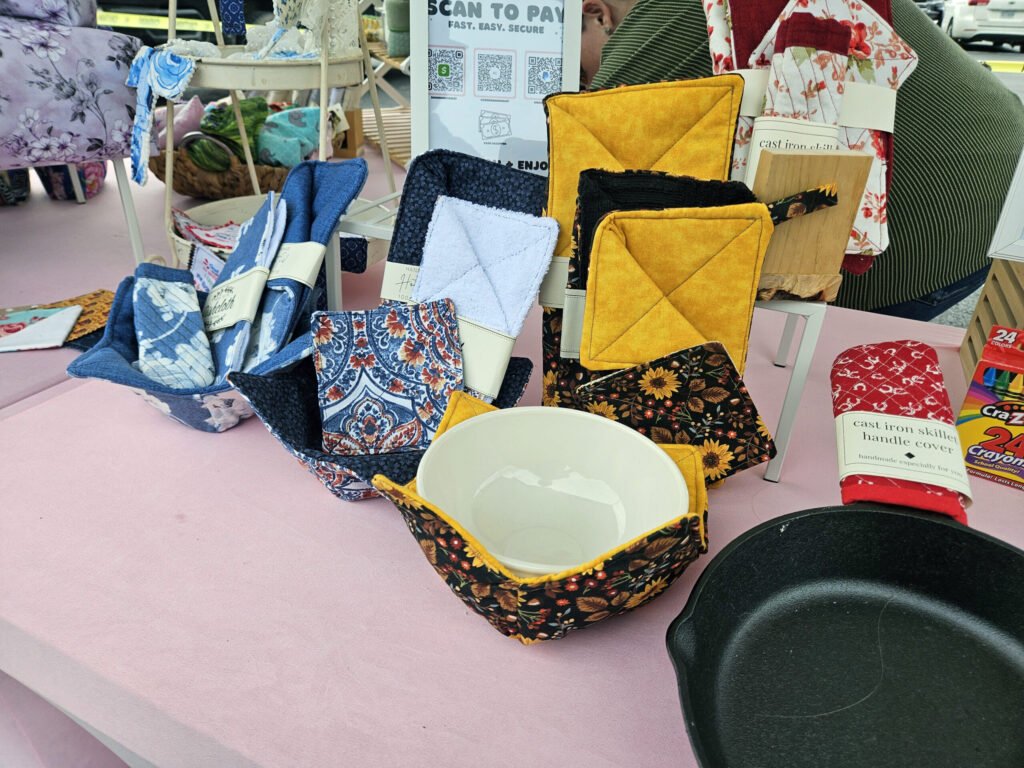 Bowl Koozies, a skillet handle cover, and hot pads from BJK Creations.