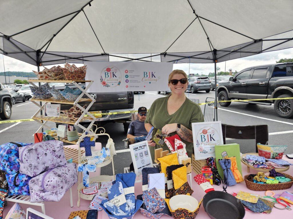 Amanda Cook and her husband Thomas in the background from BJK Creations.