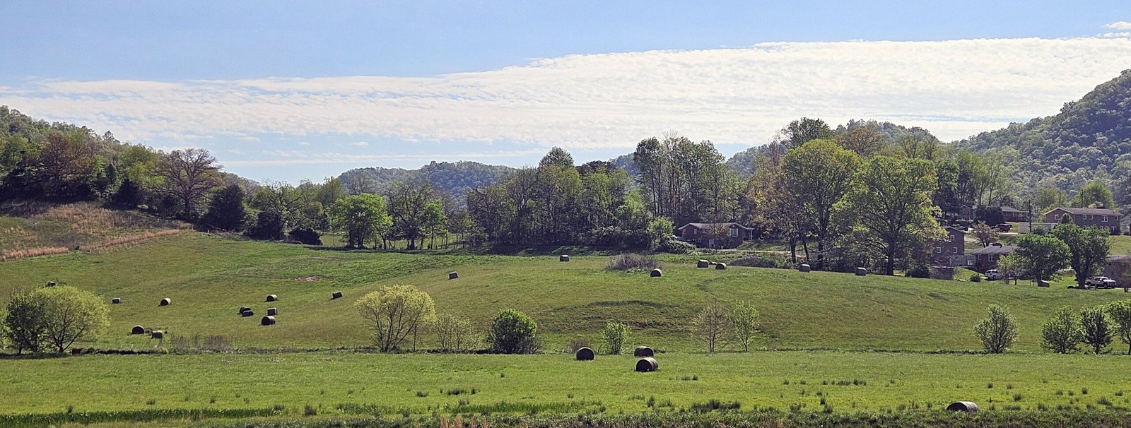 Farm Bureau Featured Image - A beautiful Farm Scene with bails of hay.