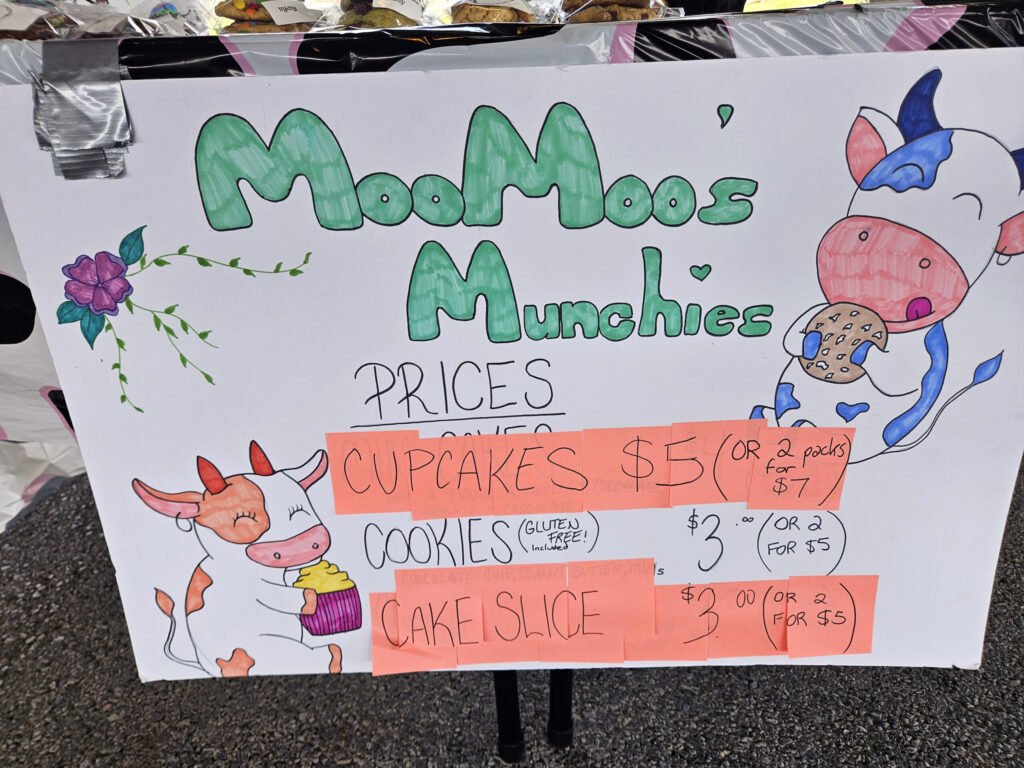 Moo Moo's Munchies hand drawn sign at the Marion Farmers Market -Photo by A. Creighton