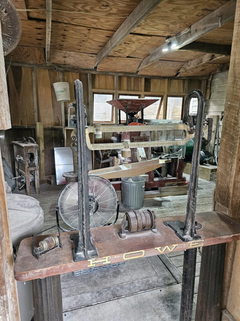 This is the place where a framer would drop off tyheir grain to be milled. It was weighed on the scale and the miller would be paid his fee.