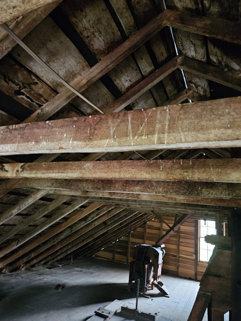 Rafters with Roman numerals XVII carved into them to tell construction workers where they go.