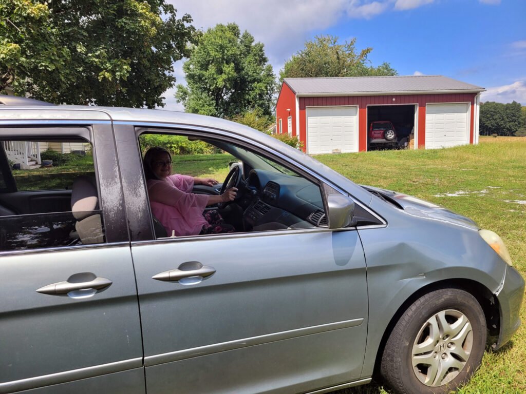 The author in her minivan - Photo by Stefanie Manuele