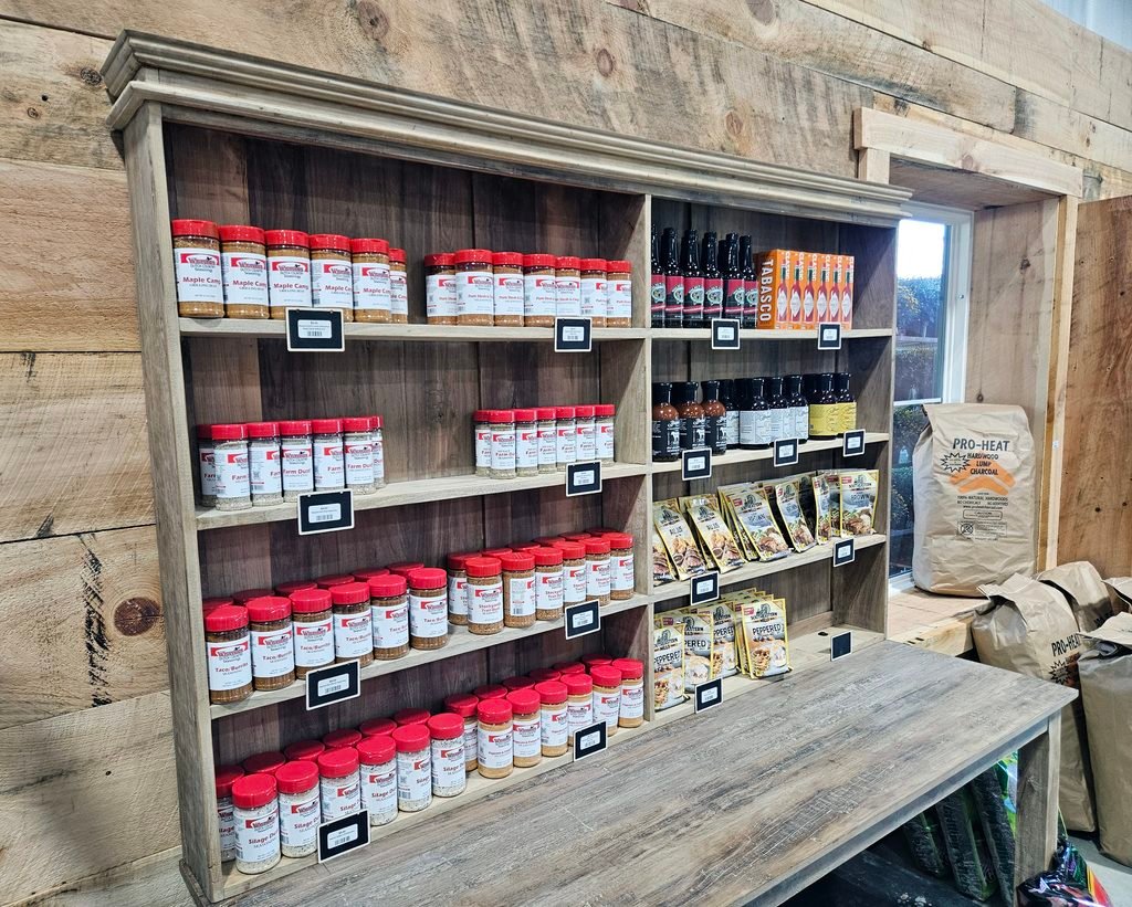 20260926_123824 - Appalachian Highlands Farmers Magazine A cabinet with spices, seasonings, and sauces.