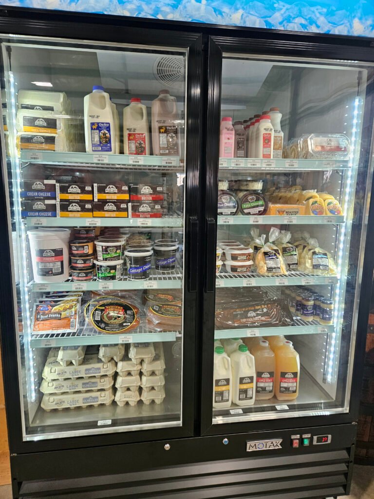 20260926_124718 - Appalachian Highlands Farmers Magazine A dairy and sausage case at Lewis' Country Store