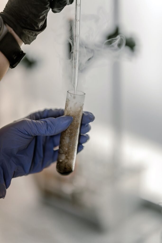Testing soil in a test tube. Cover Crops Your Way