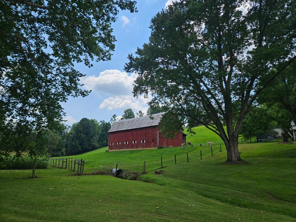 20250817_140711 - Appalachian Highlands Farmers Magazine A red barn on a farm in Tennessee - Slow Holiday Fundraiser